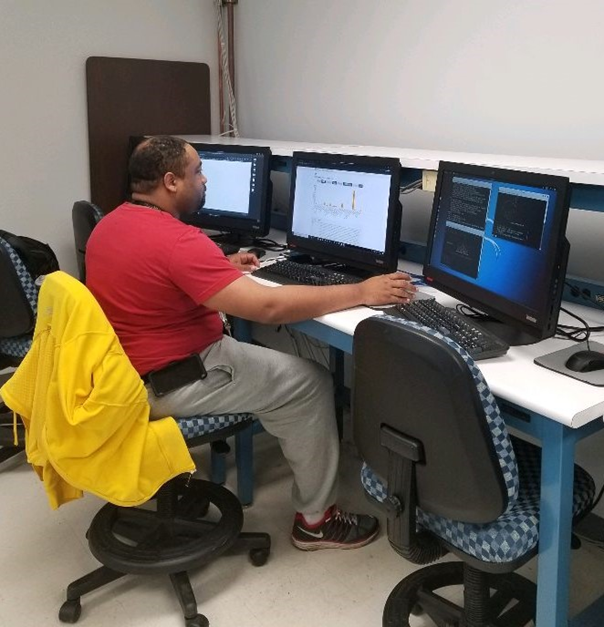 Lamont Roberts working on a computer.