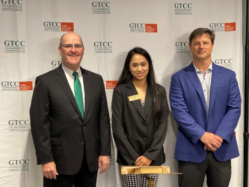 President Anthony Clarke, Ph.D., Jeshika Lamsal, SGA president, and Matt Soule board of trustees vice chair.