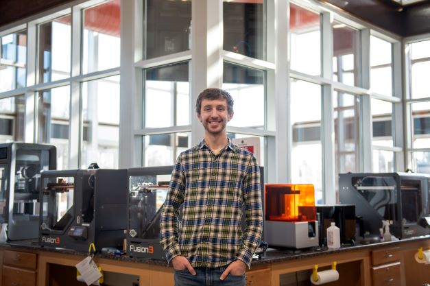 Forrest Kidd, Ph.D. poses for a portrait in his work space.