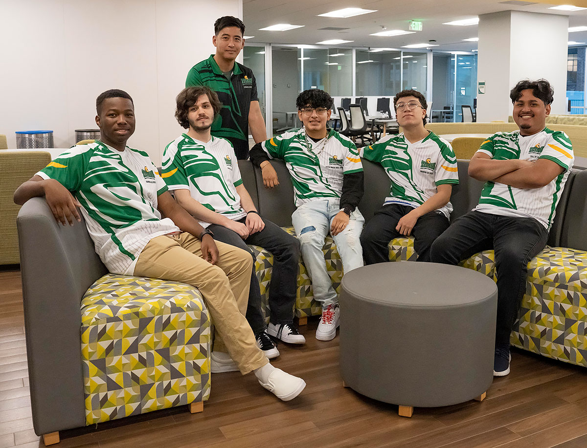 (l to r in front) DeShawn Surgeon, Jr., Tristan Fox, Diego Zeballos, Fernando Ramos, Noe Zaragoza-Tapia, coach Tu Nguyen (in back)